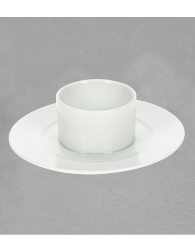 Coquetier sur grande assiette en porcelaine...